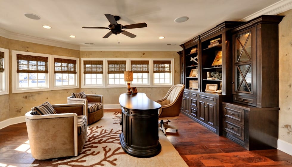 baseboards and ceiling fan traditional home office